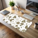 Minimalist desk pad featuring white background with golden abstract doodles and shapes in a vintage art style.
