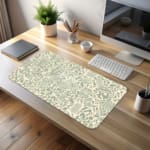 Infidu desk pad with light green abstract doodle design on cream background, featuring playful shapes, lines, and artistic elements.