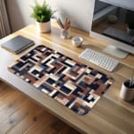 Infidu desk pad with navy and neutral geometric block pattern on white background.