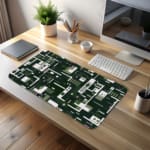 Infidu desk pad with forest green tech-inspired geometric design and vintage art influence