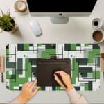 Infidu green geometric desk pad with interlocking shapes and a modern vintage art style