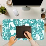 Infidu teal abstract desk pad with playful white pattern on bright background