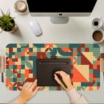 Infidu retro geometric desk pad featuring colorful shapes in warm and cool tones on a cream background, inspired by vintage wall art.