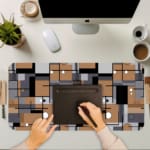 Infidu desk pad with abstract geometric block design in earthy tones