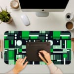 Infidu green geometric desk pad with tech-style block pattern in vibrant green and neutral tones