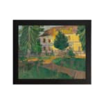 Vintage countryside house with trees and greenery wall art hung on the wall