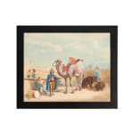 Vintage wall art featuring a camel with a rider, festival scene with colorful figures, and desert architecture in soft beige and blues. hung on the wall