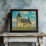 Vintage wall art of a rustic church in a calm countryside with a blue sky, white clouds, green grass, and touches of purple wildflowers. displayed on the wall