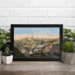 Infidu Classic Townscape with Rolling Hills Vintage Wall Art featuring a peaceful town view with green hills, a river, and church towers. displayed on the wall