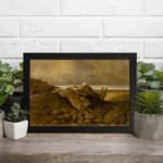 Vintage wall art of a fallen tree on a rocky hillside with earthy tones and a soft sky. displayed on the wall