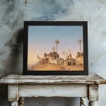 Vintage wall art of a desert village with brown huts, palm trees, and a soft blue-beige sky. displayed on the wall