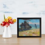 Vintage mountain landscape wall art with trees, flowers, and pastel colors creates a serene, calming atmosphere. displayed on the wall
