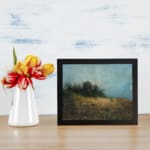 Serene vintage art of a deer in a peaceful nature landscape with soft browns, greens, and a misty atmosphere. displayed on the wall
