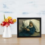 Infidu Vintage Wall Art of a girl peacefully reading with soft blue, white, and beige tones in a cozy, relaxed setting. displayed on the wall