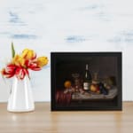 Infidu vintage still life wall art with fruit, wine, and glasses in rich warm tones on a dark background. displayed on the wall