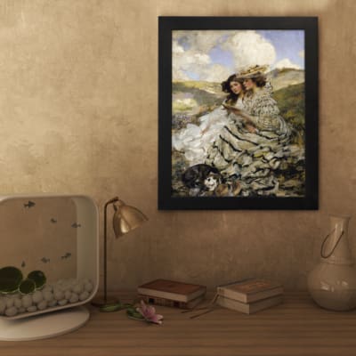 Vintage wall art showing two women in flowing dresses sitting on a grassy hillside with a dog, under a blue sky with white clouds. displayed on the wall