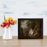 Vintage 1700s gathering wall art with elegantly dressed people in an outdoor setting surrounded by trees. displayed on the wall