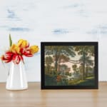 Vintage forest wall art with tall trees, red flowers, and a serene river scene. displayed on the wall