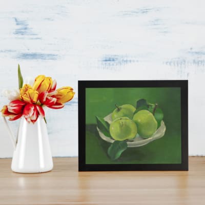 Infidu Vintage Green Apples in White Bowl Still Life Wall Art showcasing green apples in a white bowl with a soft green background. displayed on the wall
