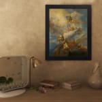 Vintage wall art depicting heavenly angels in soft tones of golden yellow, white, and light blue amidst swirling clouds. displayed on the wall