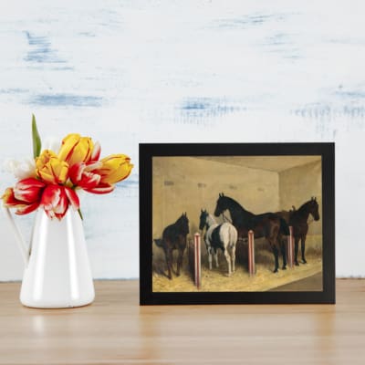 Vintage stable wall art with calm horses standing on hay in soft natural tones. displayed on the wall