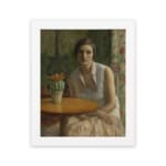 Vintage wall art of a woman in a white blouse and peach skirt sitting beside a table with a flower pot in a softly colored interior. hung on the wall