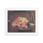 Vintage wall art of pink and yellow flowers in a white bowl with a brown textured background, framed in white. hung on the wall