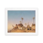 Vintage wall art of a desert village with brown huts, palm trees, and a soft blue-beige sky. hung on the wall
