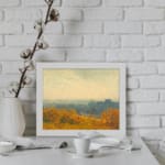 Vintage wall art of an autumn city view with golden trees, a hazy sky, and a soft, distant town skyline. displayed on the wall