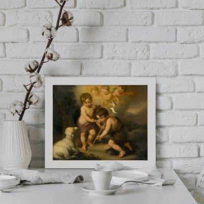 Vintage wall art of children and a lamb in a serene outdoor setting, featuring soft earthy tones and a peaceful background. displayed on the wall in a black frame
