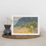Infidu vintage wall art with a peaceful mountain, a grassy field, and soft natural colors in a calming countryside scene. displayed on the wall