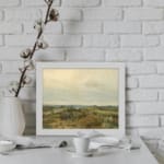Infidu vintage wall art featuring peaceful countryside river, fields, and trees in soft green, brown, and beige tones. displayed on the wall