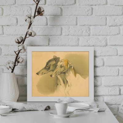 Minimalist vintage wall art featuring two greyhounds in profile, with brown tones and fine details. displayed on the wall in a white frame
