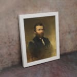 Vintage portrait wall art of a bearded man in a formal navy uniform with gold shoulder details and a smoky brown-gold background. displayed on the wall