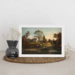 Infidu vintage wall art features a serene countryside scene with a charming house, tall trees, and a soft blue sky. displayed on the wall art in a white frame