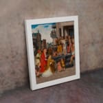 Vintage wall art of a city gathering scene with warm tones, historic buildings, and a group of people around a central figure. displayed on the wall