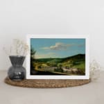 Vintage countryside wall art with hills, houses, and blue sky. displayed on the wall