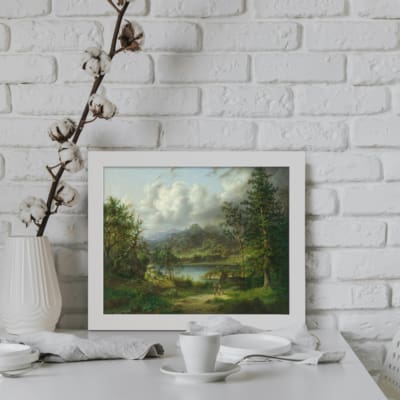 Vintage wall art depicting a scenic landscape with trees, a small water body, and distant mountains under a clear sky in soft, muted colors. displayed on the wall in a white frame