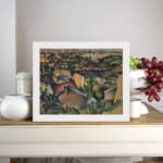 Cubist cityscape vintage wall art in warm earthy tones with abstract rooftops and buildings by Infidu. displayed on the wall