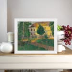Vintage countryside house with trees and greenery wall art displayed on the wall