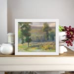 Vintage countryside wall art with yellow flower fields, tall green trees, and a soft cloudy sky in natural tones. displayed on the wall