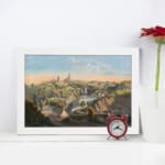 Infidu Classic Townscape with Rolling Hills Vintage Wall Art featuring a peaceful town view with green hills, a river, and church towers. displayed on the wall