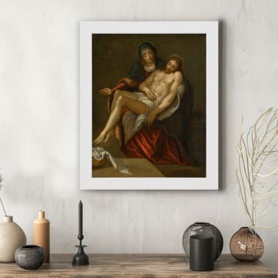 Vintage religious artwork showing two figures in a compassionate moment, with dark tones and a spiritual atmosphere. hung on the wall in a white frame