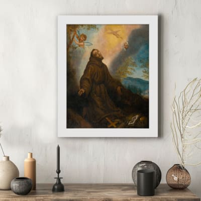 Vintage religious wall art with a monk, golden lighting, and spiritual symbols. hung on the wall in a white frame