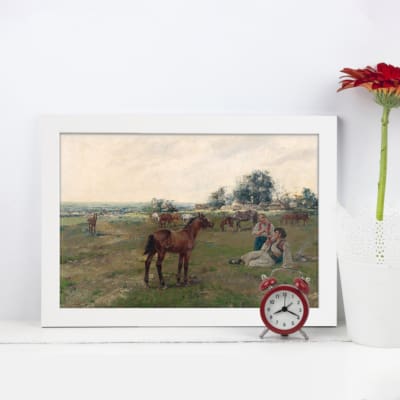 Vintage wall art showing a pastoral scene with a horse, people resting on grass, and an open field in soft earthy tones. displayed on the wall in a white frame