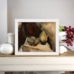 Vintage still life wall art with ceramic jug and bowl on white cloth, set against warm abstract background in earthy tones. displayed on the wall