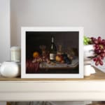 Infidu vintage still life wall art with fruit, wine, and glasses in rich warm tones on a dark background. displayed on the wall