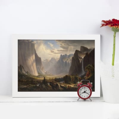Infidu Vintage Wall Art features a majestic landscape with cliffs, mist, and serene natural beauty in earthy tones. displayed on the wall in a white frame