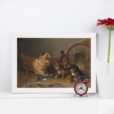 Vintage wall art featuring puppies gathered near a wooden barrel with warm earthy tones, perfect for adding a cozy, rustic touch to your space. displayed on the wall in a white frame