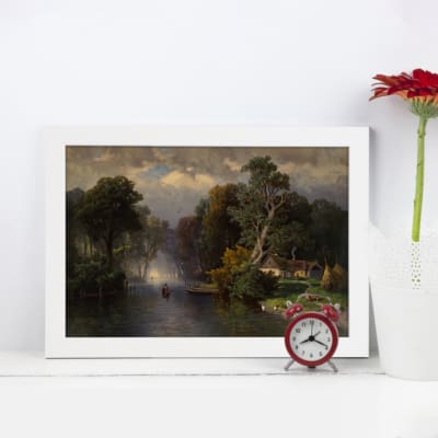 Vintage wall art of a serene river landscape with greenery, a small cottage, and a boat, crafted in soft, earthy tones for rustic decor. displayed on the wall in a white frame